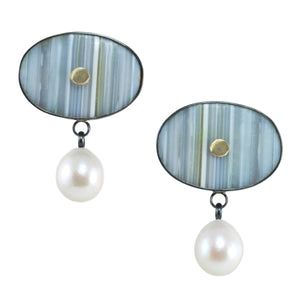 Oval banded agate earrings with vertical blue gray striping, centered 14k gold dot, and dangling white pearl drops in oxidized sterling silver.