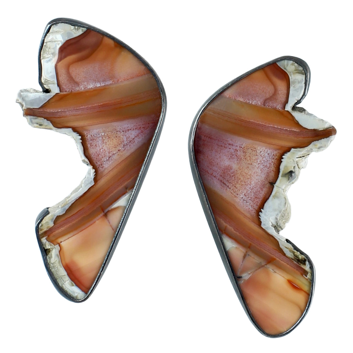 Sumatran agate slice butterfly wing earrings with exposed raw edges in oxidized silver on white background