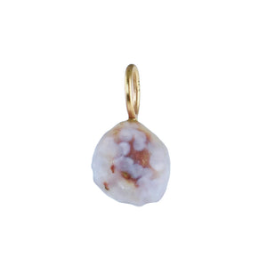 A small irregular-shaped gemstone charm featuring a white, lavender and reddish brown marbled pattern, suspended from a gold-colored loop at the top, shown against a plain white background.