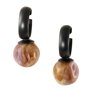 Handmade oxidized sterling silver hoop earrings with round natural shell drops in pink, cream, and golden tones on white.