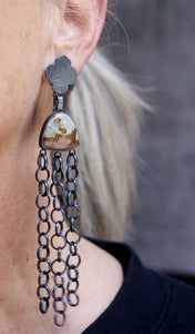 Video showing long and short polychrome jasper earrings worn, showing oxidized silver chain movement and embossed silver tops